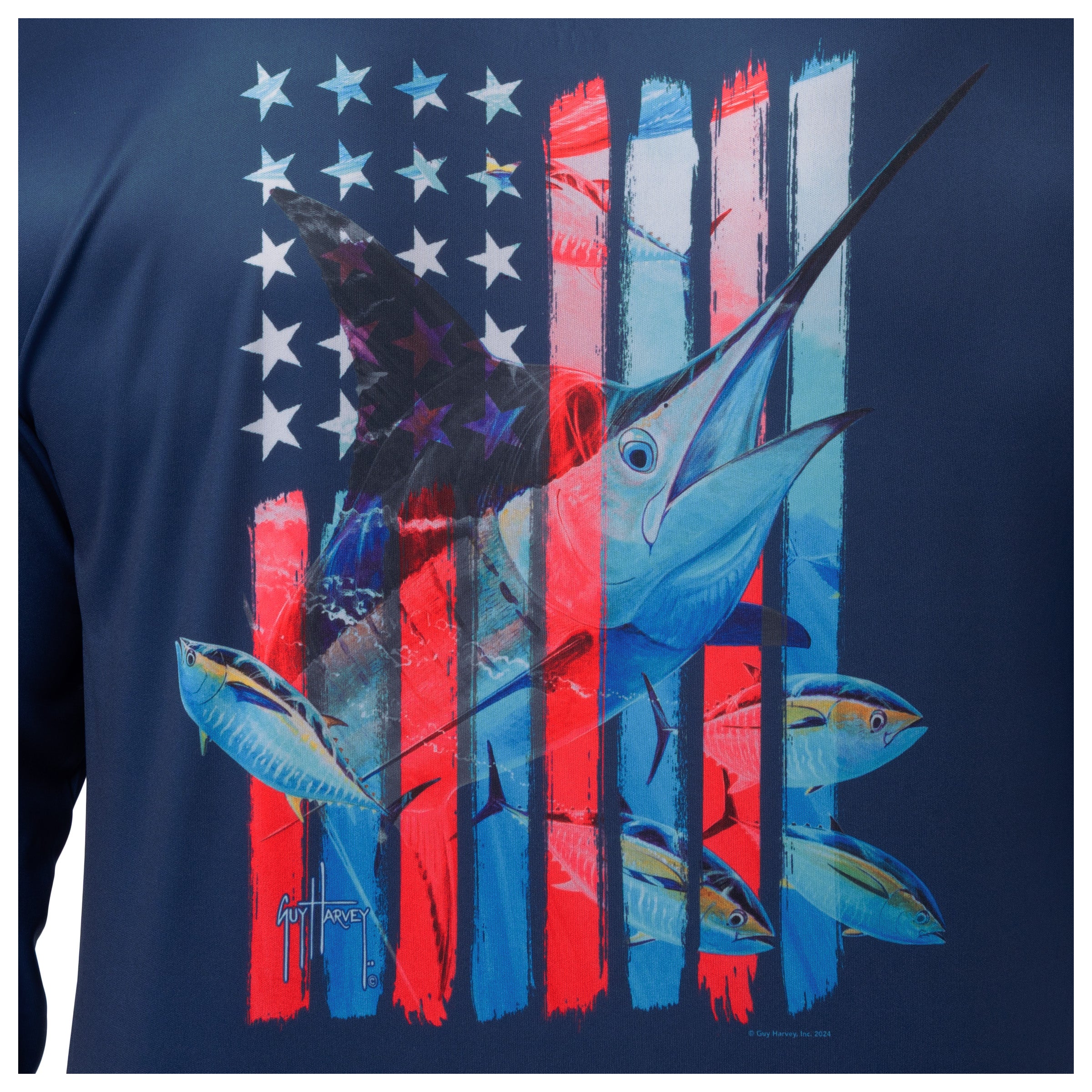 Detailed view of patriotic marlin and American flag stars and stripes artwork on back of Guy Harvey Men’s Performance Top