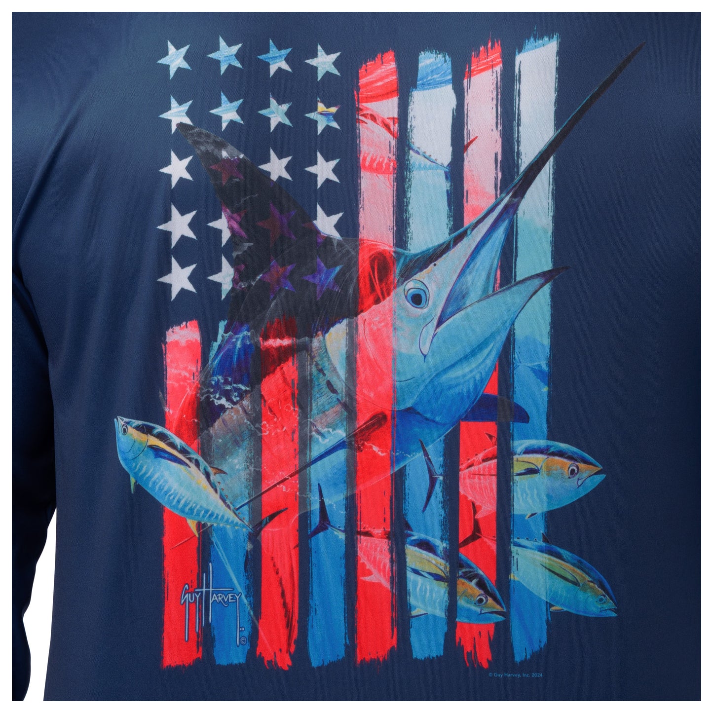 Detailed view of patriotic marlin and American flag stars and stripes artwork on back of Guy Harvey Men’s Performance Top