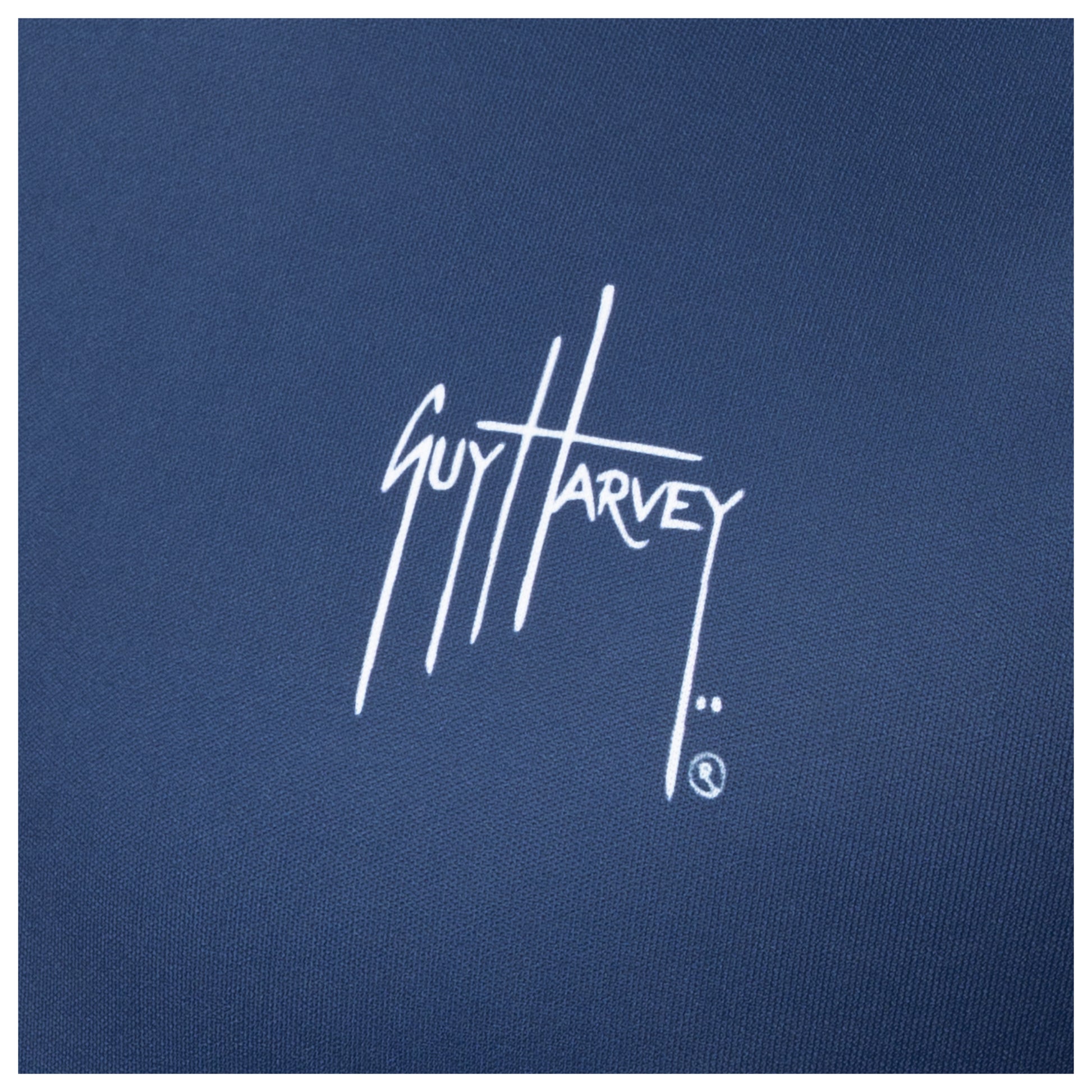 Close-up of chest Guy Harvey signature logo on Men’s Stars and Stripes Performance Long Sleeve Top