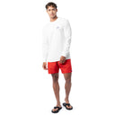 Lifestyle photo of model wearing Guy Harvey Men’s Tag and Release Lightweight Long Sleeve Tee while fishing