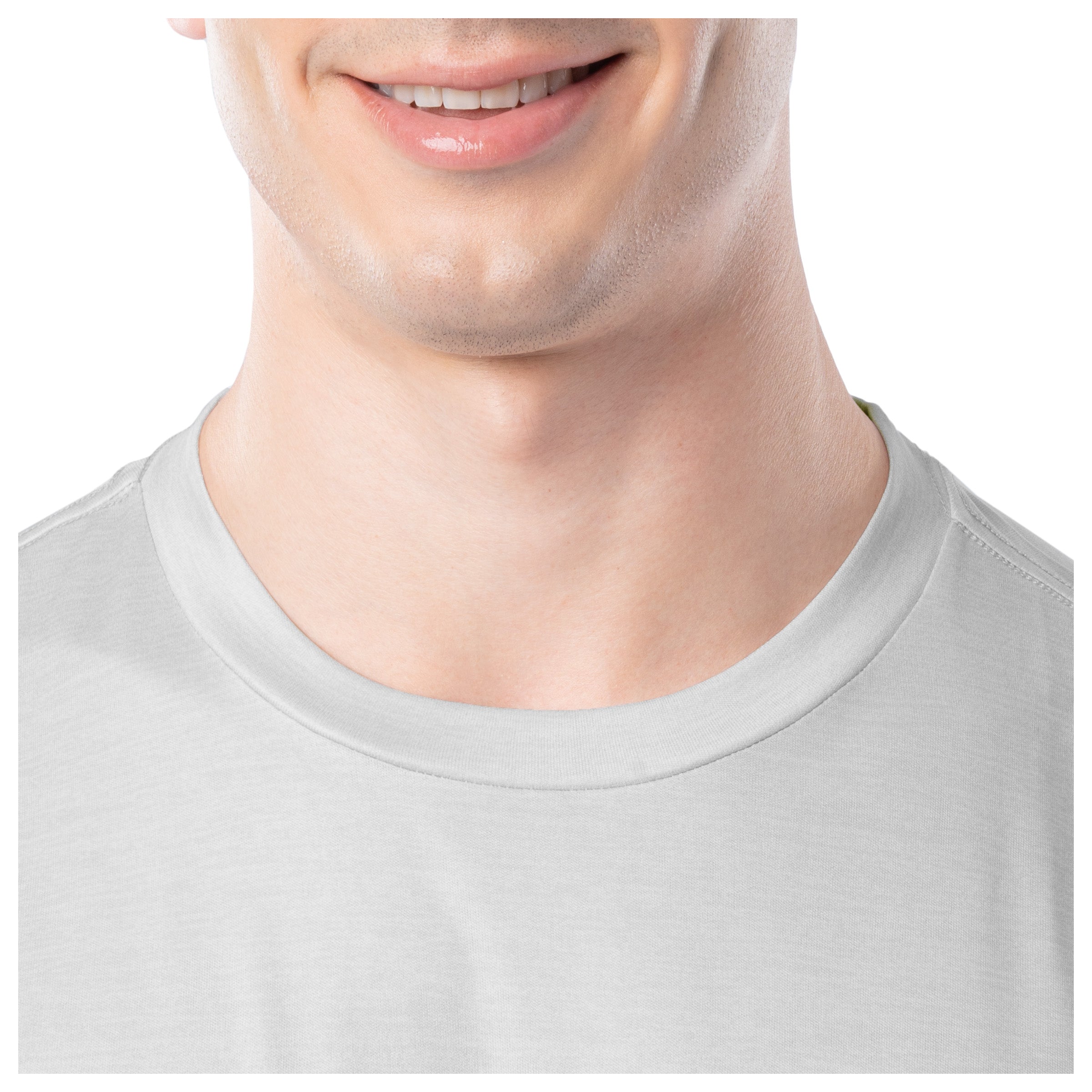Close-up of a person wearing a light gray t-shirt on a white background
