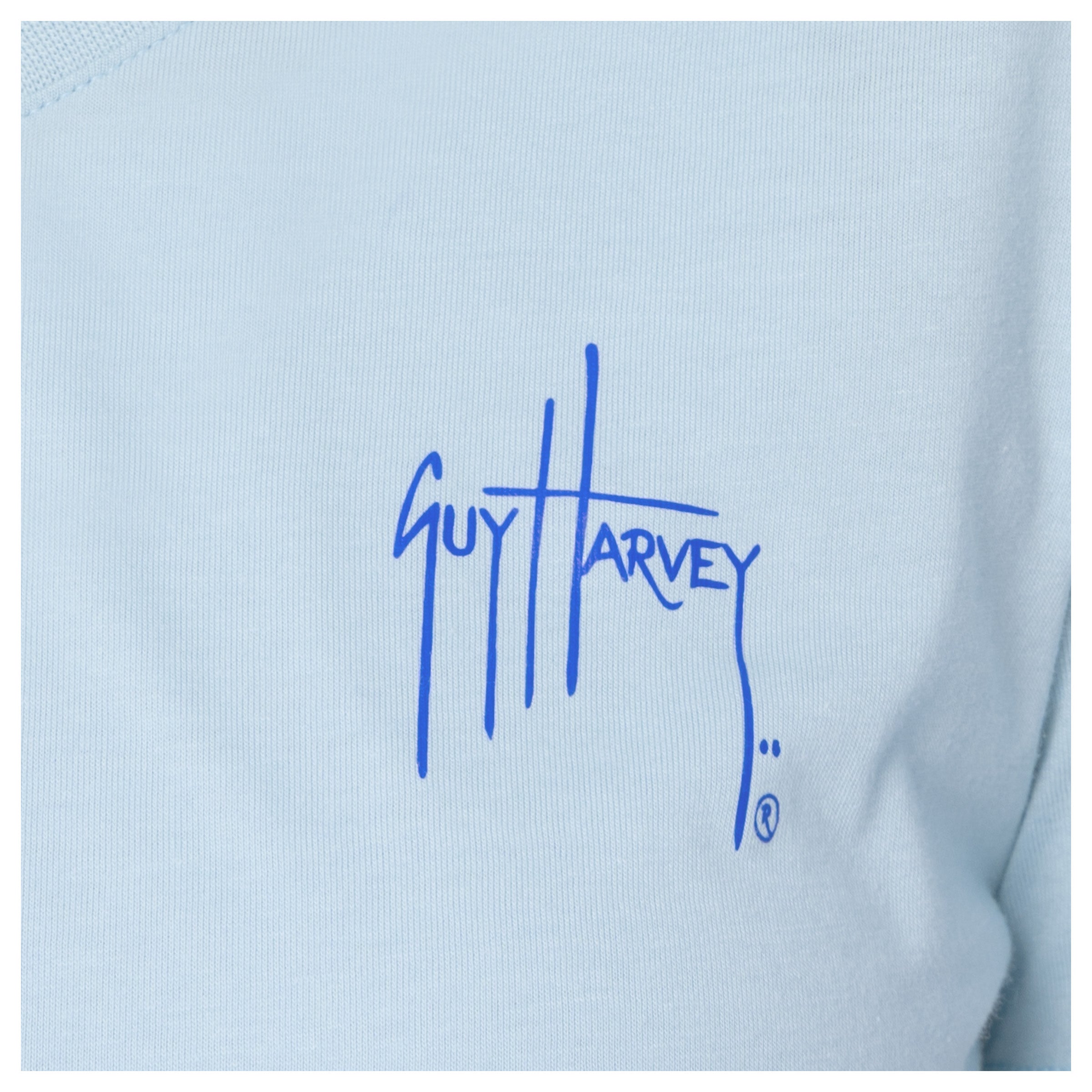 Close-up of left chest Guy Harvey signature logo on Women’s Floral Bills V-Neck Tee