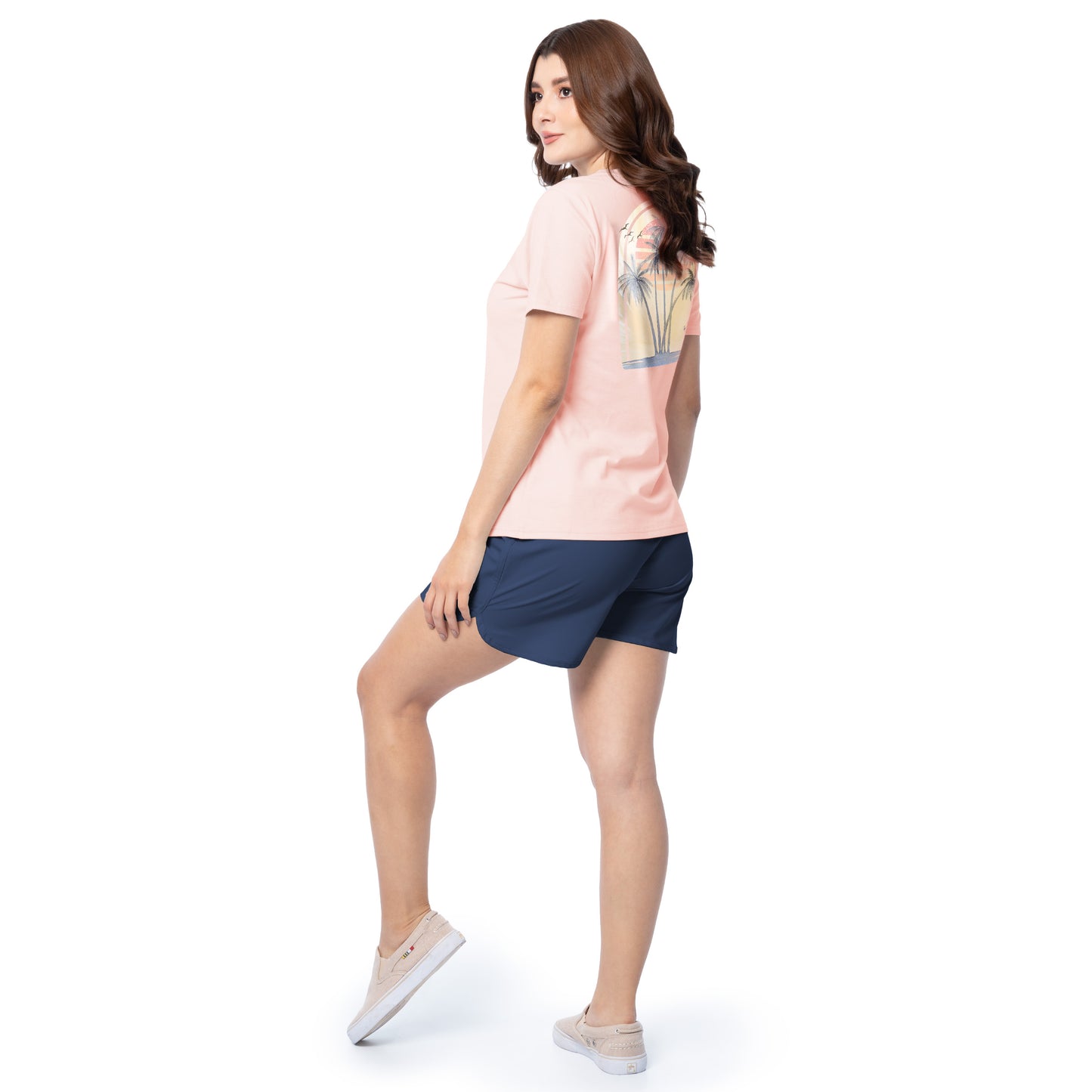 Lifestyle photo of model wearing Guy Harvey Women’s Palm Breeze V-Neck Short Sleeve Tee for coastal casual wear