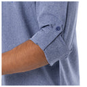 Shows the sleeves of the shirt rolled up and holded with a secure button in place to make it also a short sleeve shirt when needed.