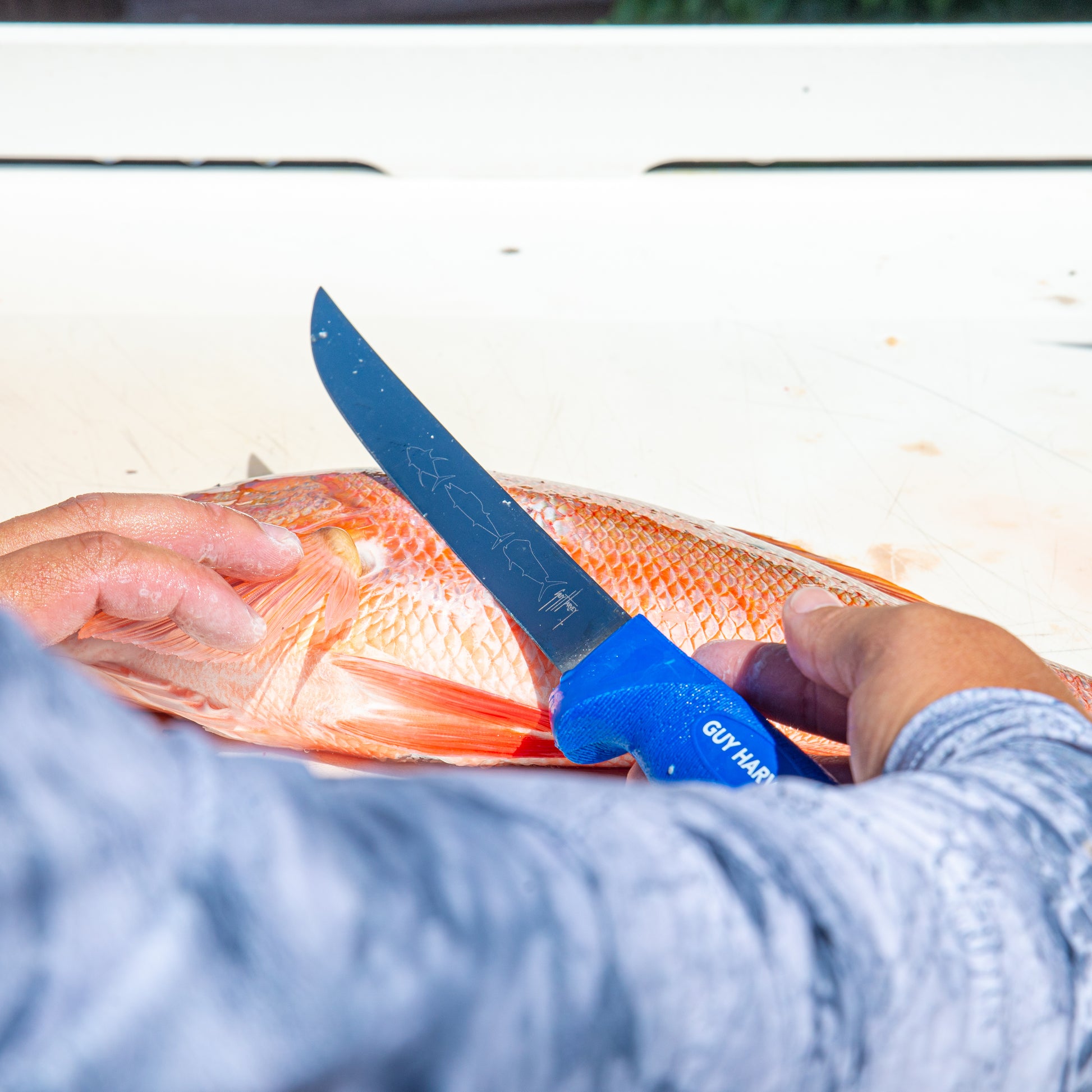 Guy Harvey | 8 Wide, Stiff Flexible Fillet Knife with SofGrip Handle